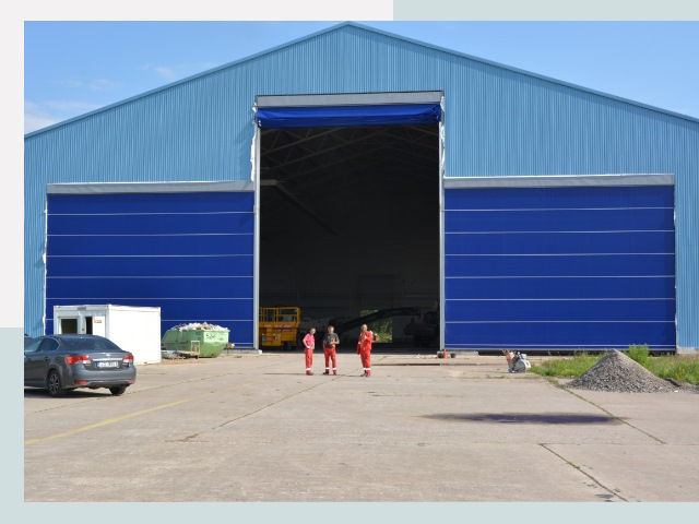 Ангарные ворота в Комсомольск-на-Амуре от СтальСтрой-Кмс по цене 612 руб.